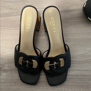 Gucci Black Leather Mules with Gold Heel